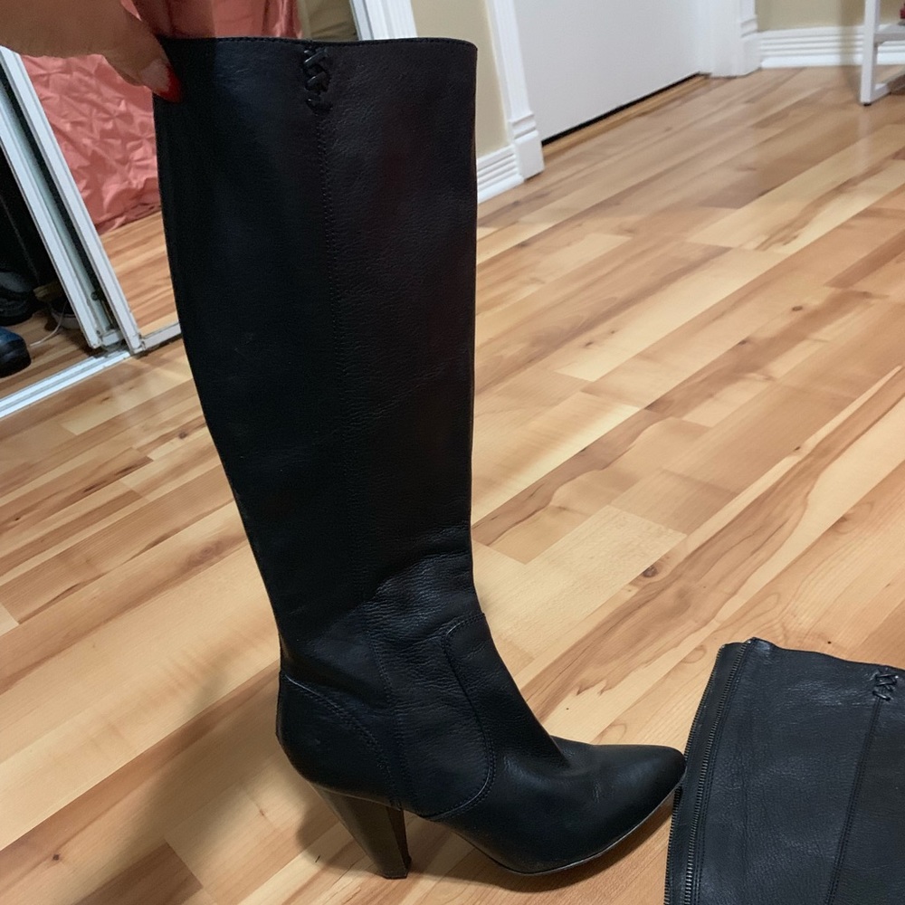 Black heeled knee high Frye boots